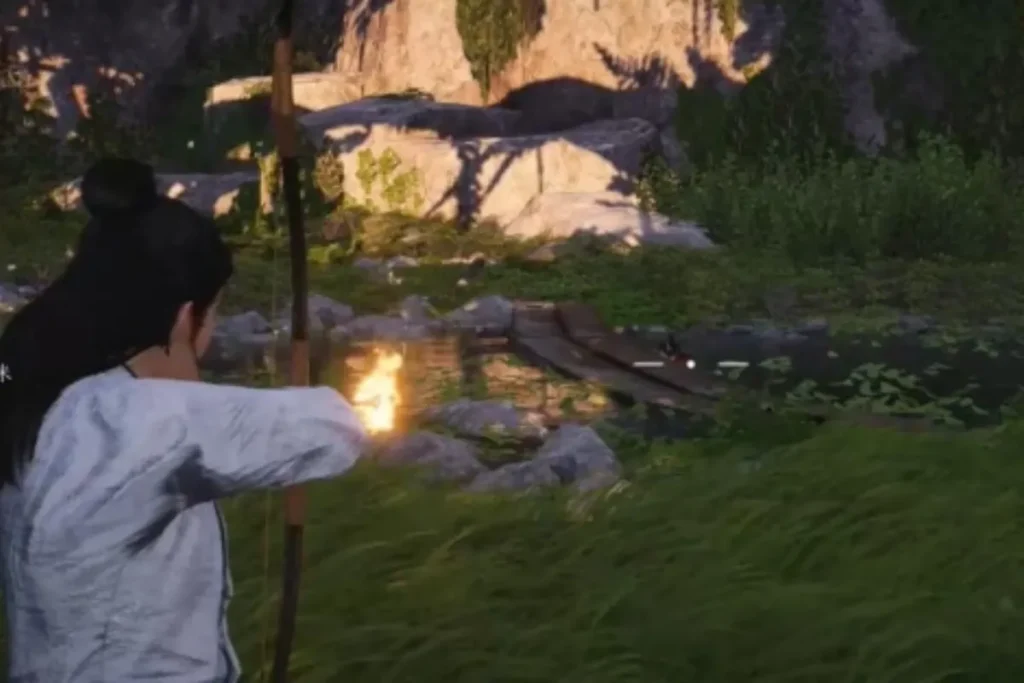 在大樹後面的河邊有一個NPC，靠過去與其進行互動